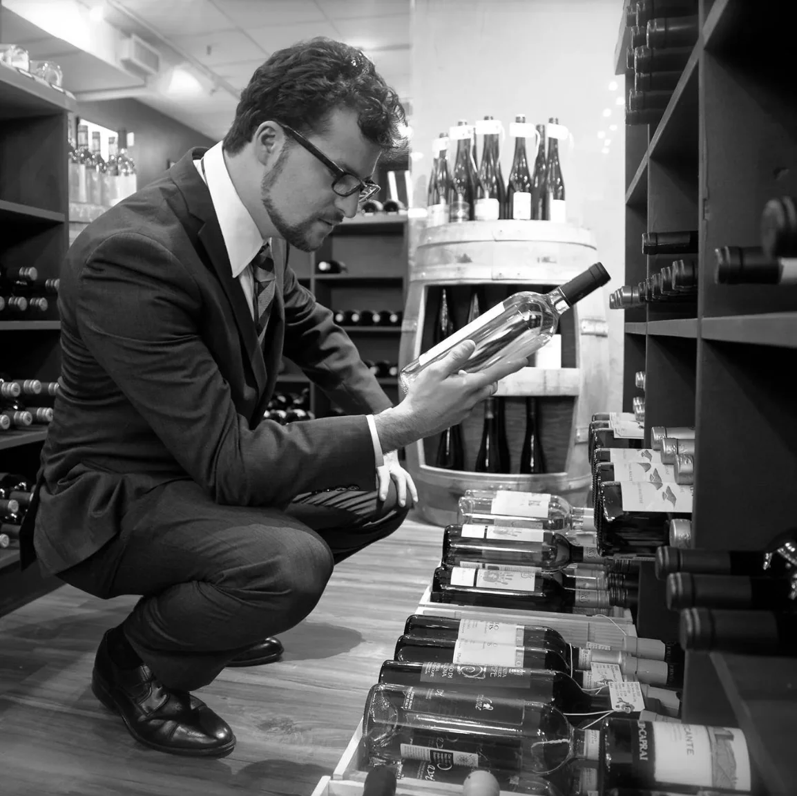 Zach Glassman in a wine shop
